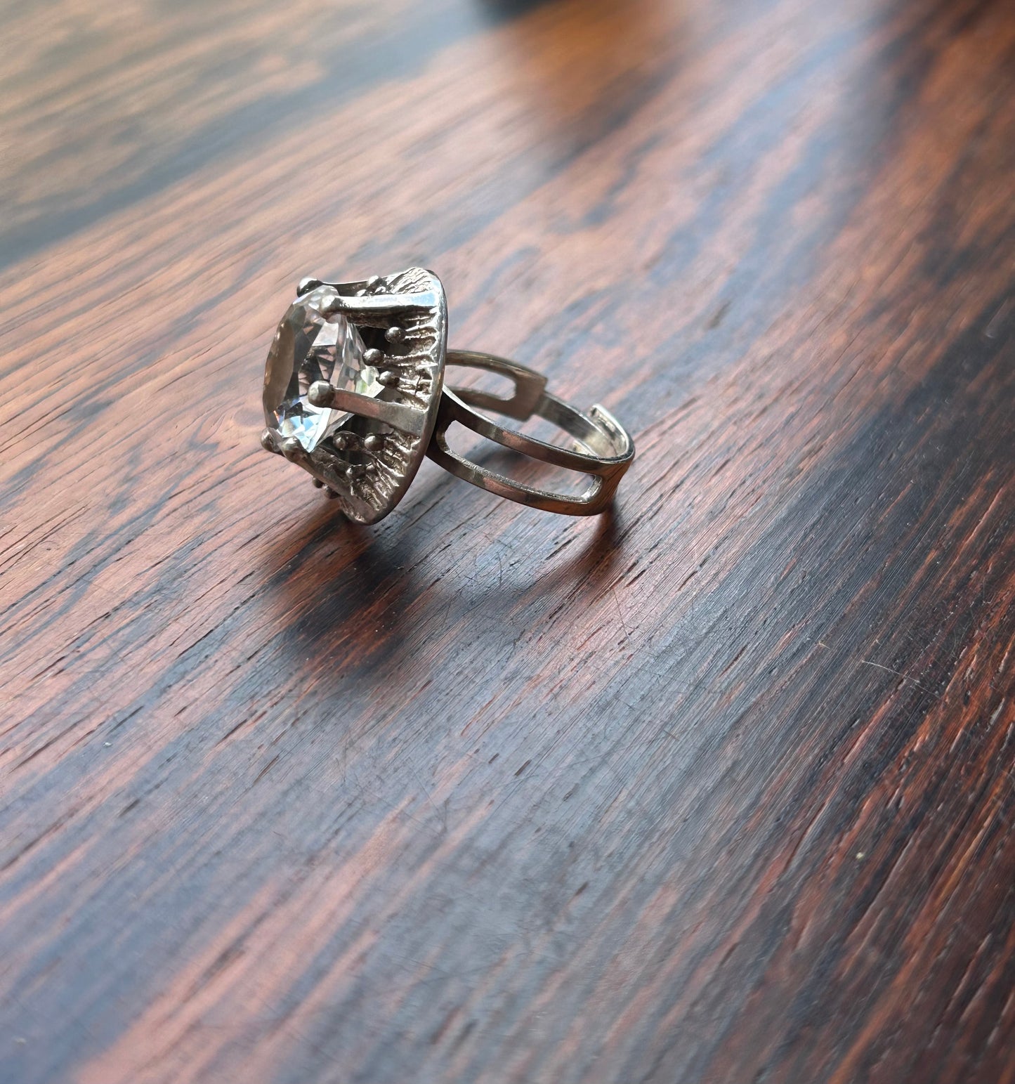 Silver ring with a large cut rock crystal